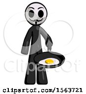 Black Little Anarchist Hacker Man Frying Egg In Pan Or Wok