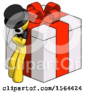 Poster, Art Print Of Yellow Plague Doctor Man Leaning On Gift With Red Bow Angle View