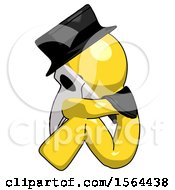 Yellow Plague Doctor Man Sitting With Head Down Facing Sideways Left