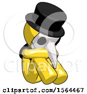 Yellow Plague Doctor Man Sitting With Head Down Facing Angle Right
