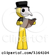 Yellow Plague Doctor Man Reading Book While Standing Up Facing Away