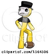 Poster, Art Print Of Yellow Plague Doctor Man Standing With Foot On Football