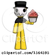 Yellow Plague Doctor Man Presenting Pink Cupcake To Viewer