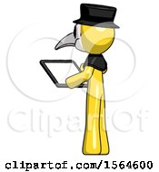 Yellow Plague Doctor Man Looking At Tablet Device Computer With Back To Viewer