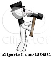 Poster, Art Print Of White Plague Doctor Man Hammering Something On The Right