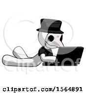 White Plague Doctor Man Using Laptop Computer While Lying On Floor Side Angled View