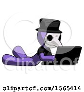 Poster, Art Print Of Purple Plague Doctor Man Using Laptop Computer While Lying On Floor Side Angled View