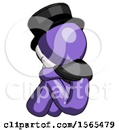 Poster, Art Print Of Purple Plague Doctor Man Sitting With Head Down Back View Facing Left