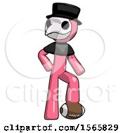 Poster, Art Print Of Pink Plague Doctor Man Standing With Foot On Football