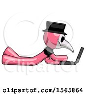 Poster, Art Print Of Pink Plague Doctor Man Using Laptop Computer While Lying On Floor Side View