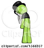 Poster, Art Print Of Green Plague Doctor Man Depressed With Head Down Back To Viewer Left