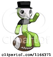 Poster, Art Print Of Green Plague Doctor Man Sitting On Giant Football