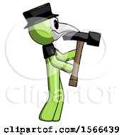Poster, Art Print Of Green Plague Doctor Man Hammering Something On The Right