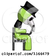 Poster, Art Print Of Green Plague Doctor Man Using Laptop Computer While Sitting In Chair View From Side