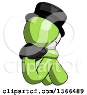 Poster, Art Print Of Green Plague Doctor Man Sitting With Head Down Back View Facing Right