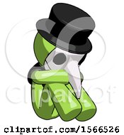 Poster, Art Print Of Green Plague Doctor Man Sitting With Head Down Facing Angle Right