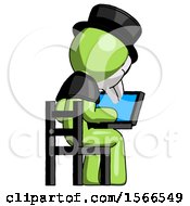Green Plague Doctor Man Using Laptop Computer While Sitting In Chair View From Back