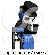 Poster, Art Print Of Blue Plague Doctor Man Using Laptop Computer While Sitting In Chair Angled Right