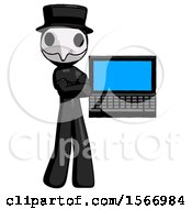 Black Plague Doctor Man Holding Laptop Computer Presenting Something On Screen