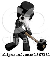 Black Plague Doctor Man Hitting With Sledgehammer Or Smashing Something At Angle