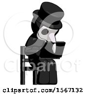 Poster, Art Print Of Black Plague Doctor Man Using Laptop Computer While Sitting In Chair Angled Right