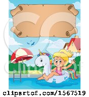 Girl Floating On A Unicorn Swim Toy