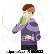 Teen Guy Drinking A Green Smoothie