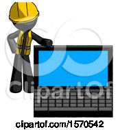 Black Construction Worker Contractor Man Beside Large Laptop Computer Leaning Against It