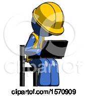 Blue Construction Worker Contractor Man Using Laptop Computer While Sitting In Chair Angled Right
