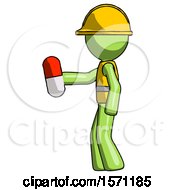 Green Construction Worker Contractor Man Holding Red Pill Walking To Left