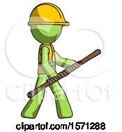 Green Construction Worker Contractor Man Holding Bo Staff In Sideways Defense Pose