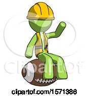 Poster, Art Print Of Green Construction Worker Contractor Man Sitting On Giant Football