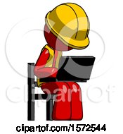 Red Construction Worker Contractor Man Using Laptop Computer While Sitting In Chair Angled Right