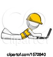 Poster, Art Print Of White Construction Worker Contractor Man Using Laptop Computer While Lying On Floor Side View