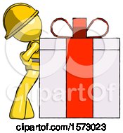 Yellow Construction Worker Contractor Man Gift Concept Leaning Against Large Present