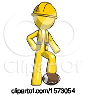 Poster, Art Print Of Yellow Construction Worker Contractor Man Standing With Foot On Football