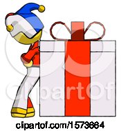 Yellow Jester Joker Man Gift Concept Leaning Against Large Present