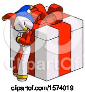 White Jester Joker Man Leaning On Gift With Red Bow Angle View