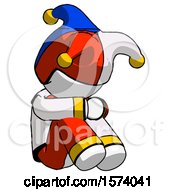 White Jester Joker Man Sitting With Head Down Facing Angle Right