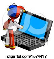 Poster, Art Print Of Red Jester Joker Man Using Large Laptop Computer