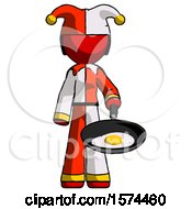 Red Jester Joker Man Frying Egg In Pan Or Wok
