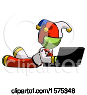 Poster, Art Print Of Green Jester Joker Man Using Laptop Computer While Lying On Floor Side Angled View