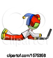 Poster, Art Print Of Green Jester Joker Man Using Laptop Computer While Lying On Floor Side View