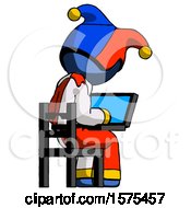 Poster, Art Print Of Blue Jester Joker Man Using Laptop Computer While Sitting In Chair View From Back