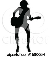 Clipart Of A Silhouetted Female Guitarist Royalty Free Vector Illustration
