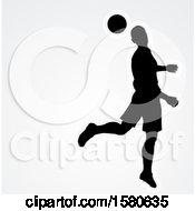 Poster, Art Print Of Silhouetted Male Soccer Player Heading A Ball Over Gray With Text Space