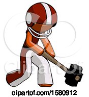 Orange Football Player Man Hitting With Sledgehammer Or Smashing Something At Angle