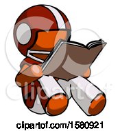 Orange Football Player Man Reading Book While Sitting Down