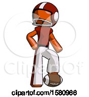 Poster, Art Print Of Orange Football Player Man Standing With Foot On Football