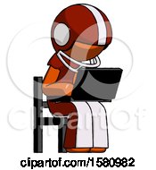 Poster, Art Print Of Orange Football Player Man Using Laptop Computer While Sitting In Chair Angled Right